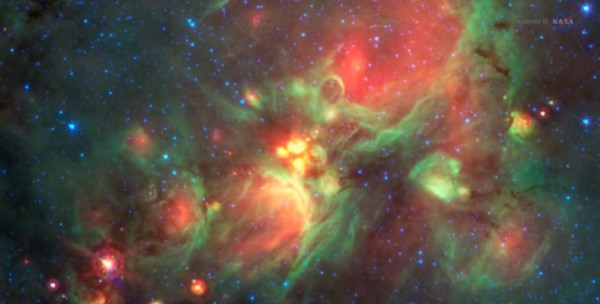 Voluntários encontraram bolas amarelas nas imagens de infravermelho obtidas pelo telescópio Spitzer. Essas regiões do espaço não são realmente amarelas, mas aparecem desta cor nas imagens enviadas pelo telescópio – na verdade, a manipulação das cores é um recurso para que possamos observar as sutilezas da luz infravermelha, não distinguível para o olho humano. (foto: Reprodução / Nasa)